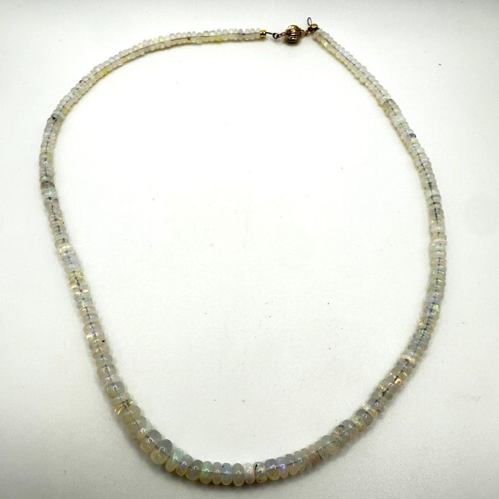 20.5" rondelle, graduatedโ Opalโbeaded necklace with a 14kt yellow gold clasp!